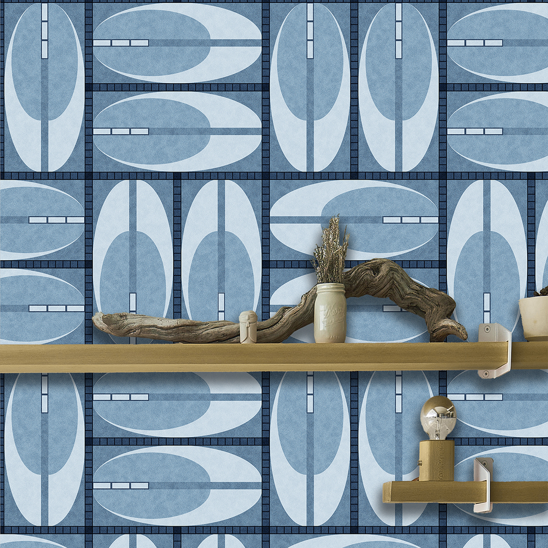 The artwork features a repeating geometric pattern of symmetrical shapes resembling elongated, curved diamonds or petals in various shades of blue and green. Each shape is split vertically with one half filled with a light blue and the other half filled with green or darker blue. The background is a light, almost pastel blue, which provides a soft yet vibrant backdrop. One of the blue shapes near the upper left contains a white starburst element, adding a focal point of brightness to the composition. The overall design conveys a modern, mid-century aesthetic with clean lines and harmonious color contrasts.